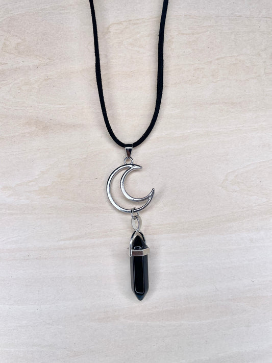 Black Resin Stone Hanging From Metal Crescent Moon