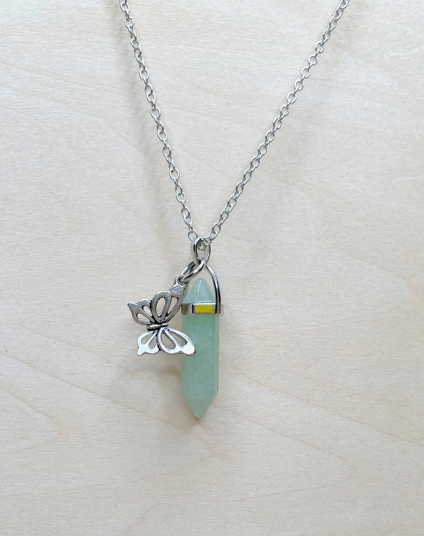 Light Aqua Calming Resin Jewel Necklace with Butterfly Charm