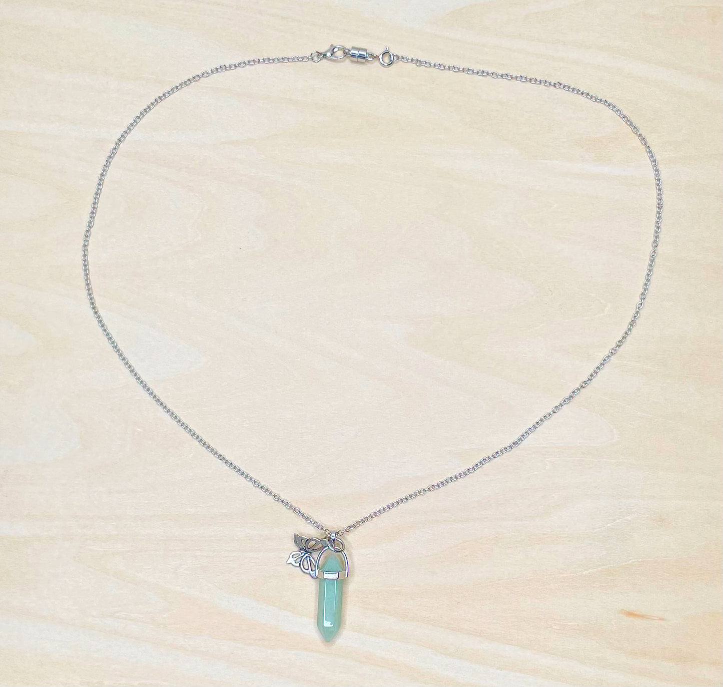 Light Aqua Calming Resin Jewel Necklace with Butterfly Charm