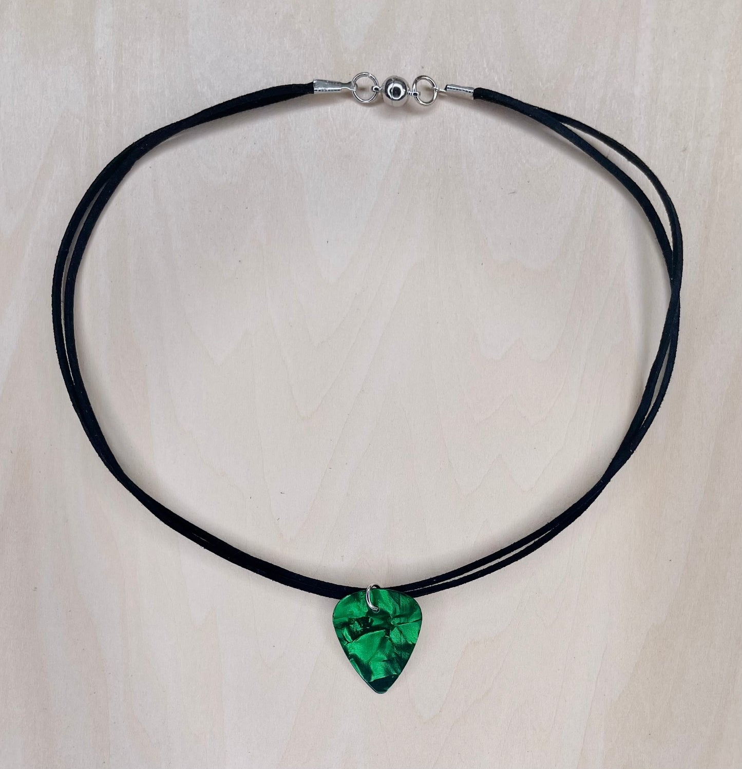 Green Envy Guitar Pick Necklace on Faux Suede Cord
