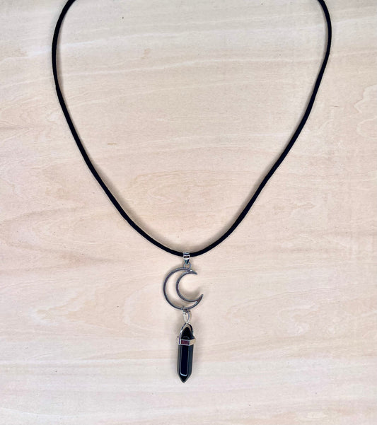 Black Resin Stone Hanging From Metal Crescent Moon